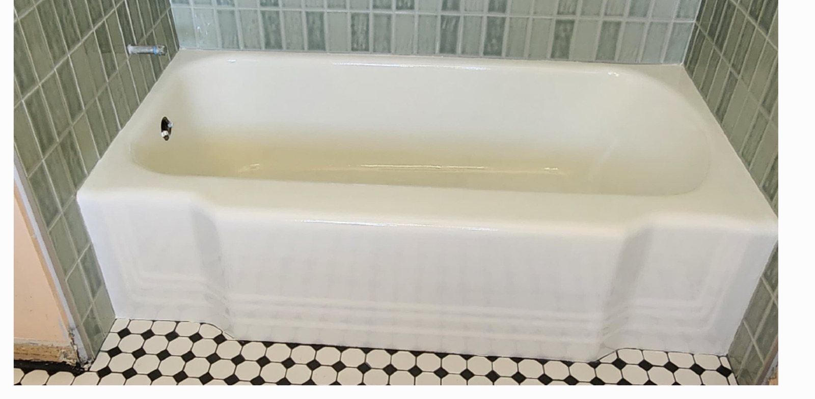 After: dated beige bathtub reglazed to bright white